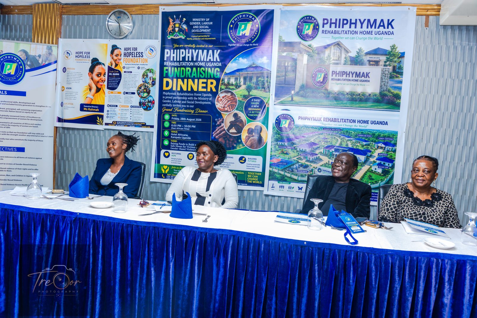 The head table in front of the Fundraising Dinner banners